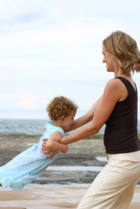 Mom Spinning Daughter